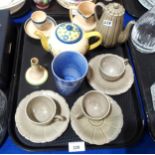 A collection of Ashtead pottery pieces including a 1934 Mitcham charter year mug, glazed in lavender