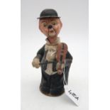 A painted pressed card clockwork musical figure, modelled as a morose violinist Condition Report: