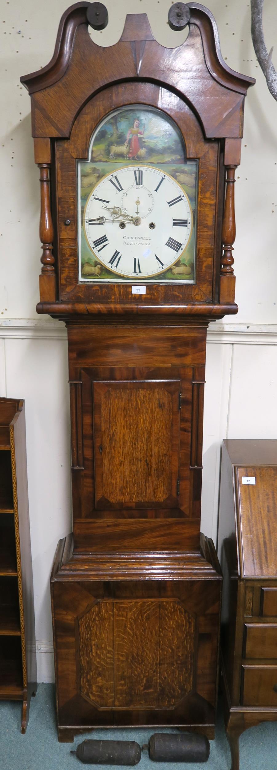 A 19th century oak cased Couldwell Deep-Coull grandfather clock with painted face depicting