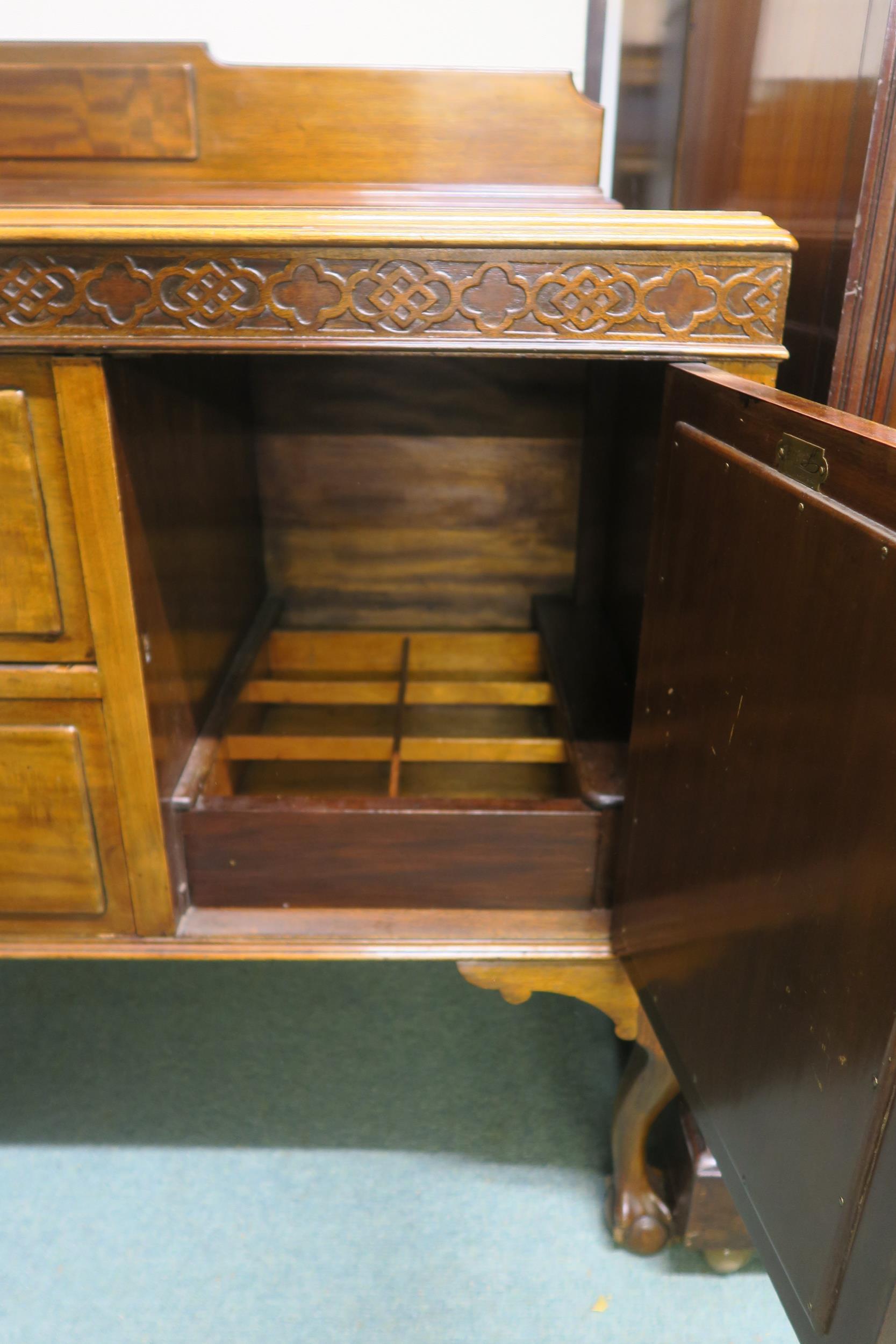 An early 20th century mahogany sideboard with two central drawers flanked by cabinet doors on - Image 5 of 7