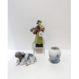 A Royal Doulton figure Sweet Lavender, HN1373 together with a Royal Copenhagen figure of a a calf