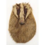 A badger mask sporran, lacking eyes, the leather pouch stamped "McFarlane Maker Kingussie" Condition