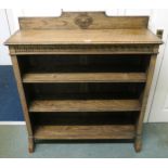 A 20th century oak three tier open bookcase with Grecian key design, 103cm high x 91cm wide x 27cm