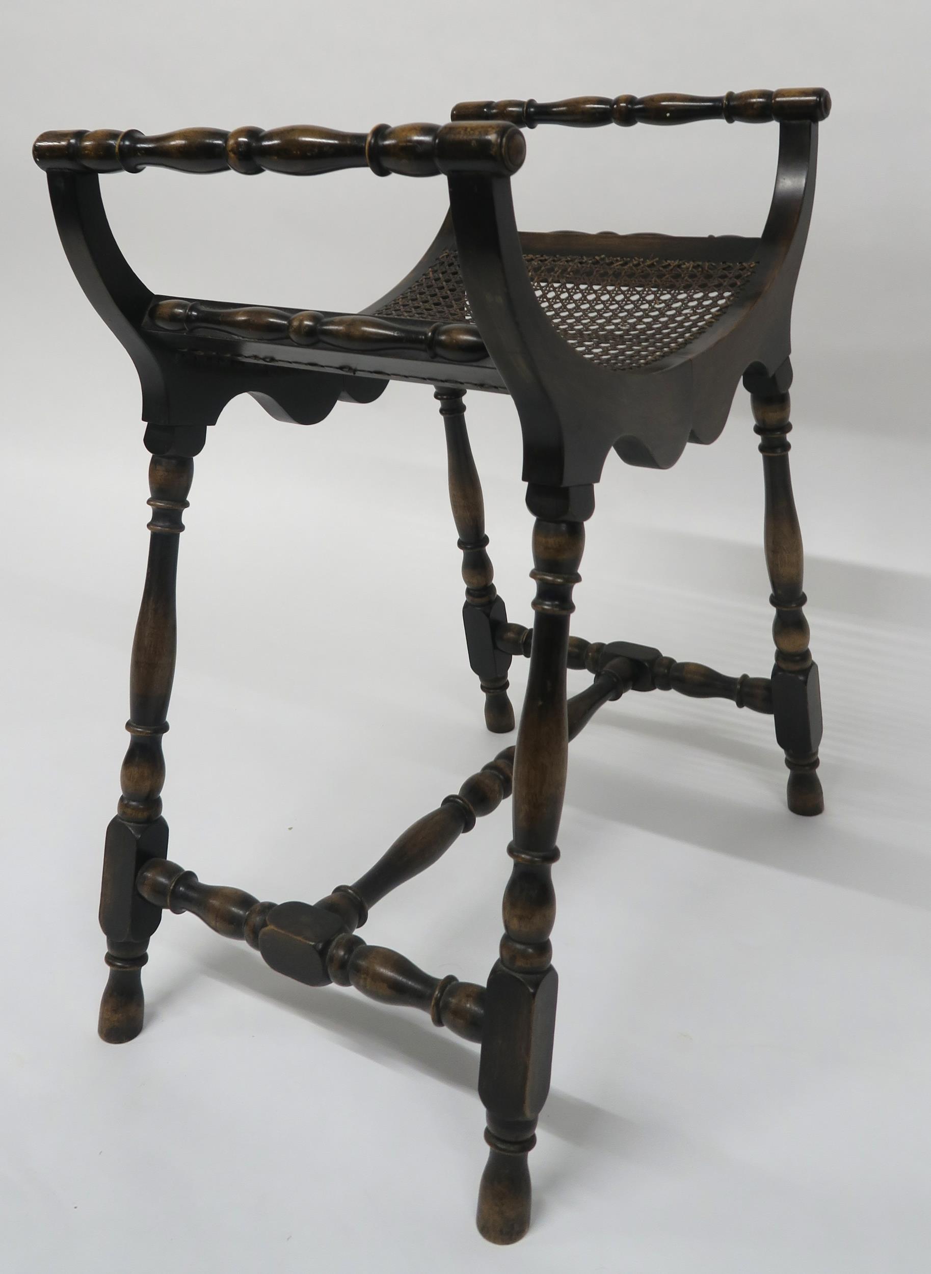 A 20th century mahogany bergere stool with turned arms and stretchered supports, 69cm high x 59cm - Image 4 of 4