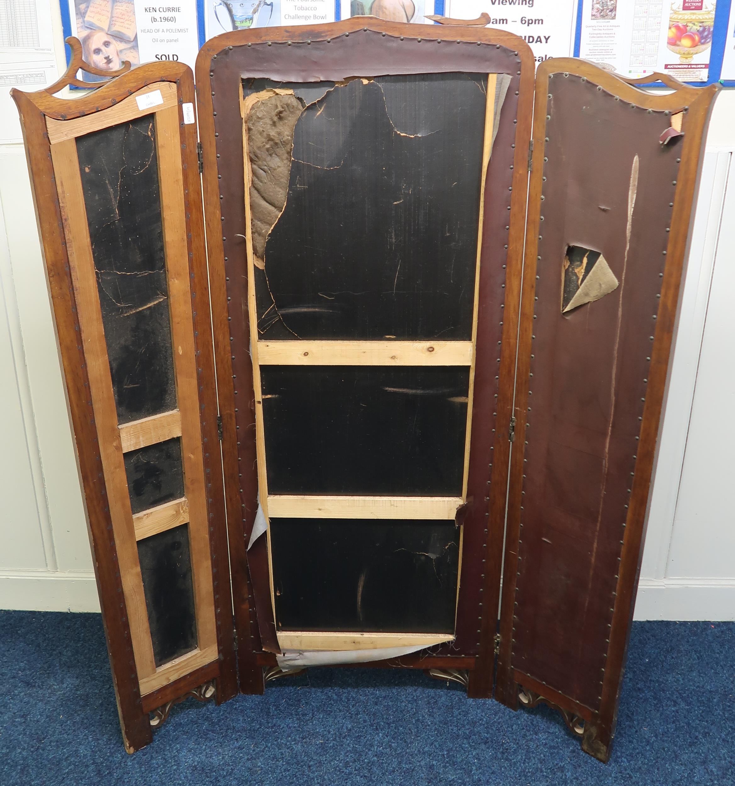 A Victorian mahogany framed screen surrounding overpainted embossed leather panels 166cm high - Image 2 of 3