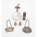 A collection of silver including a silver topped cut glass oil decanter, by Barker Brothers, a heavy
