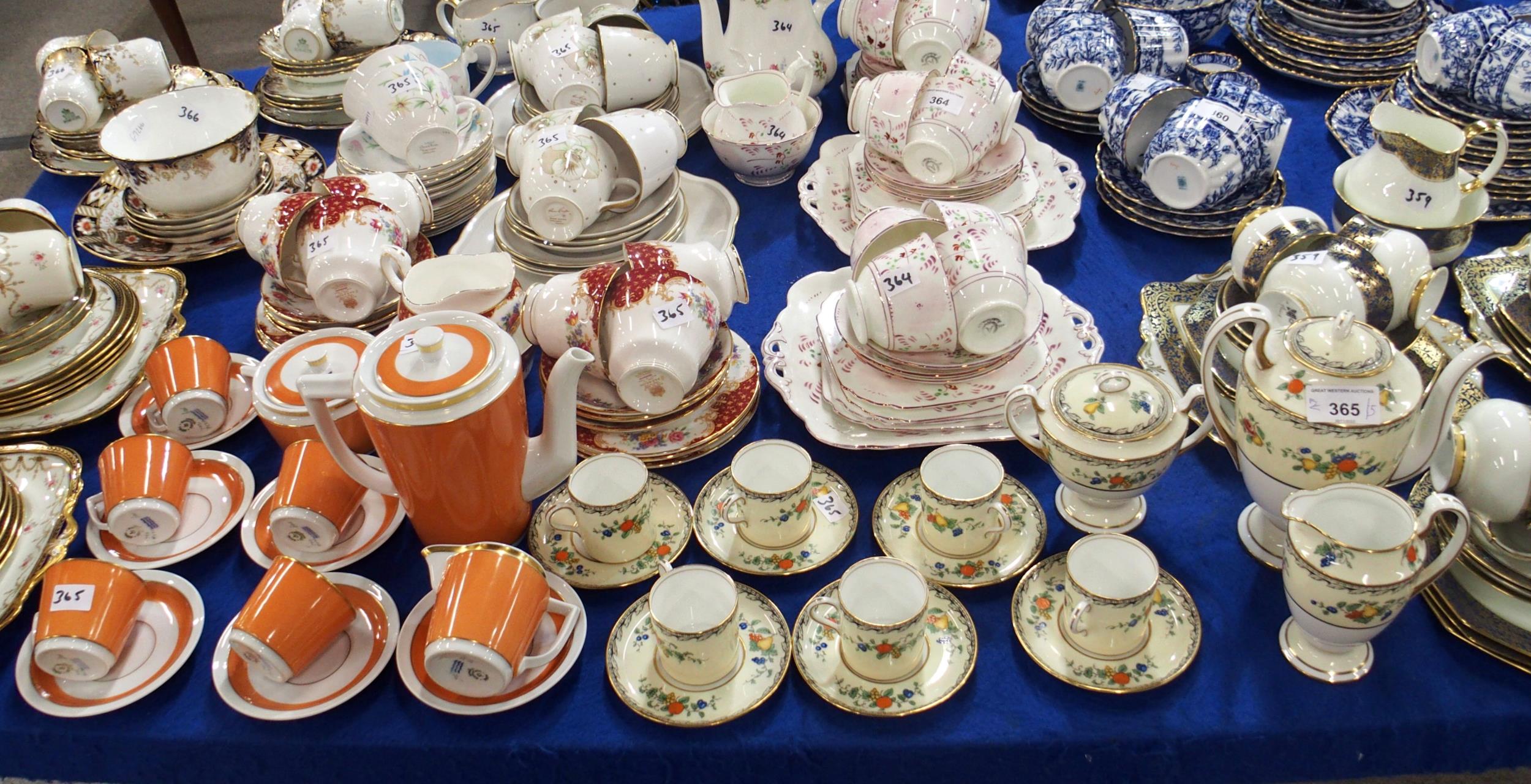 An Aynsley coffee set decorated with fruit on a cream ground, a Royal Copenhagen coffee set on