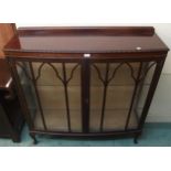 A 20th century mahogany astragal glazed display cabinet on cabriole supports, 123cm high x 120cm