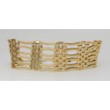 A 9ct gold  gate bracelet, with heart shaped clasp, length 17cm, weight 31.4gms  Condition Report: