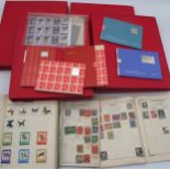 A collection of British and international stamps, including five various hallmarked silver ingot "