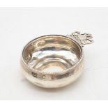 *WTHDRAWN* A George III silver porringer, of round form, with a gadrooned rim, with a scrolling ope
