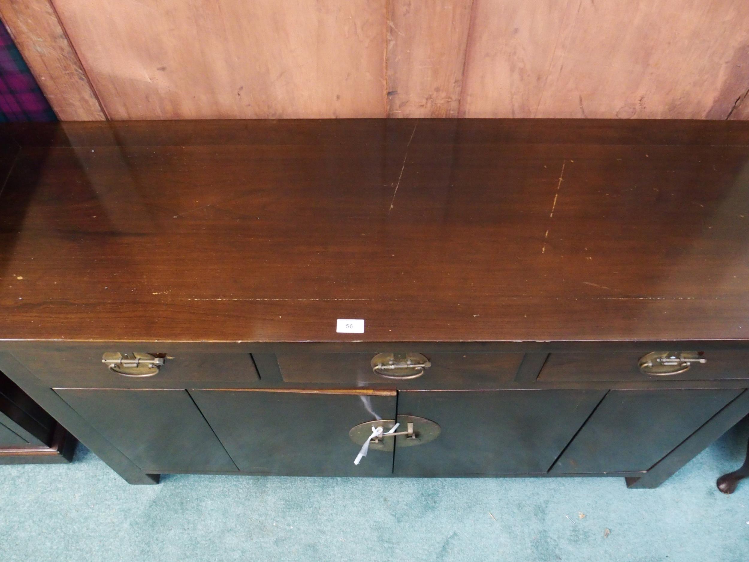 A 20th century Oriental hardwood sideboard with scroll end top over three drawers over pair of - Image 3 of 6