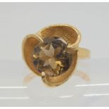 A 9ct gold smoky quartz set ring, size M, weight 4.4gms Condition Report:Available upon request
