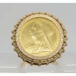 An 1901 Victoria full gold sovereign in a 9ct gold decorative ring mount, size P1/2, weight 15gms