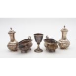 A collection of silver including a Turkish silver niello drinking cup, with a reticulated swimming