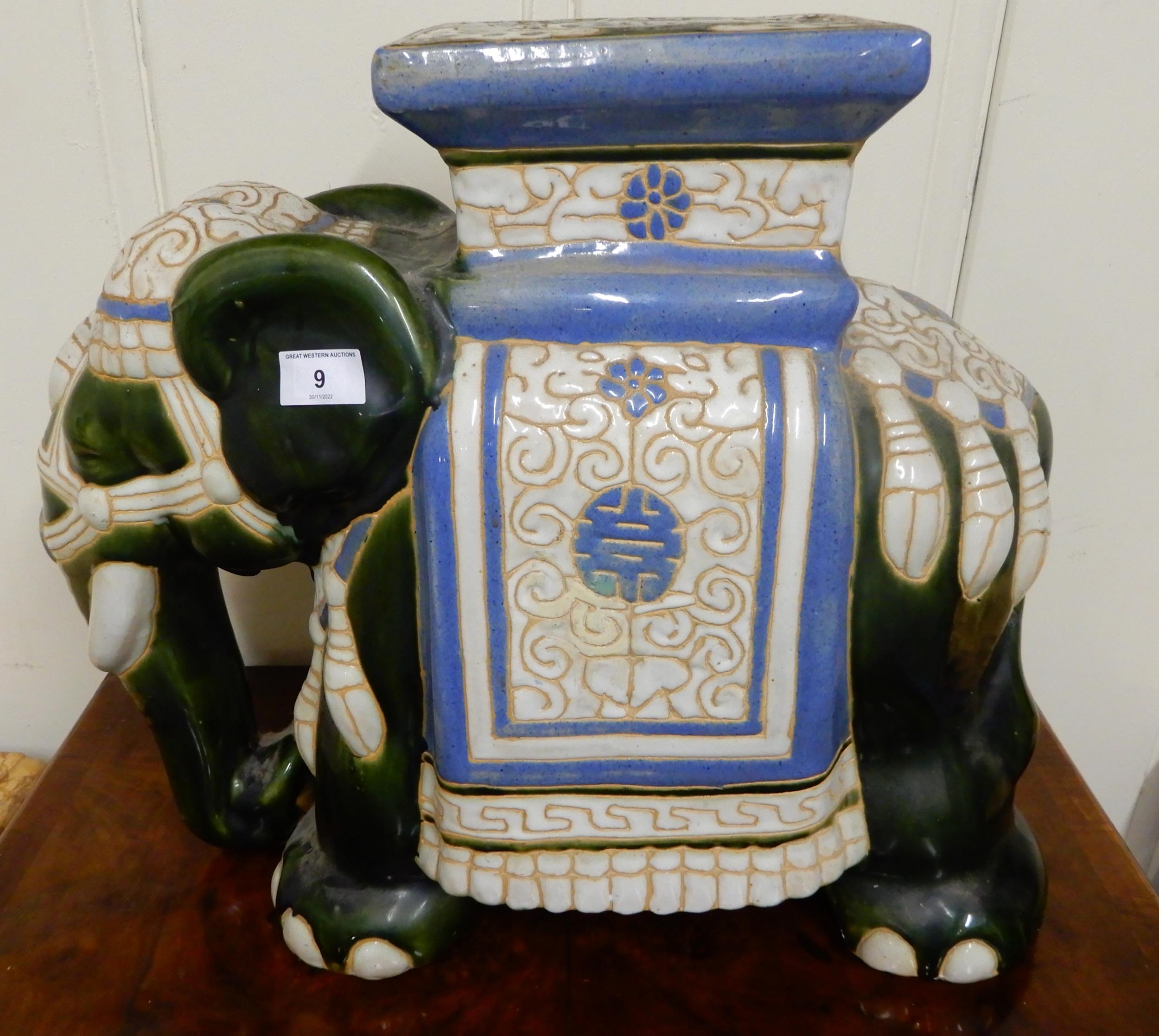 A 20th century ceramic elephant garden plant stand, 43cm high Condition Report:Available upon