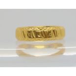 A 22ct gold wedding ring, full UK hallmarks, size N1/2, weight 6.3gms Condition Report:Available