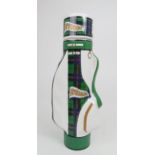 A novelty Douglas Mc Gibbons whisky decanter in the form of a golf bag.  No. B19536 Condition