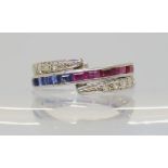 A night & day ring set with sapphires, rubies and diamonds, set in white metal. (af) size N,