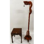 A 20th century hardwood Oriental standard lamp carved in the form of a dragon, 158cm high and a