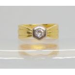 An 18ct gold diamond ring, set with a 0.10cts brilliant cut diamond, finger size F, weight 4.1gms