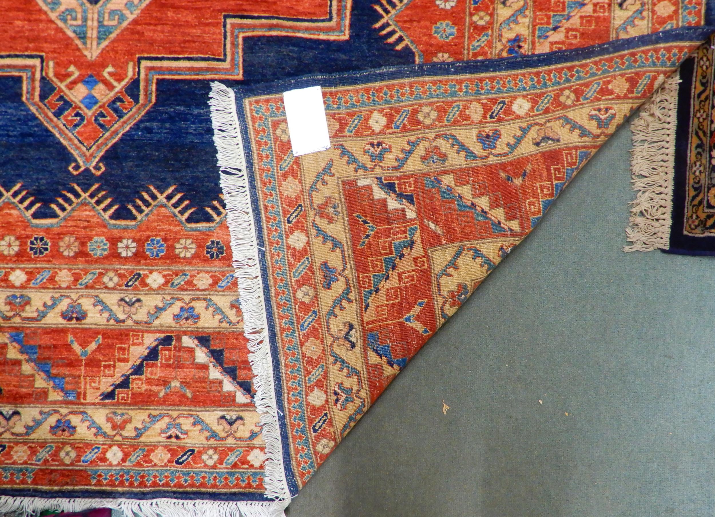 A dark blue ground Pakistani super Garous rug with three geometric medallions and multicoloured - Image 5 of 5