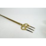 An three pronged brass telescopic sliding toasting fork Condition Report:Available upon request