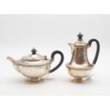 A silver tea and coffee pot, of baluster form, with bands of vine decoration, by Elkington & Co,