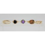 Three 9ct gold rings and two pairs of yellow metal hoop earrings, signet ring size Z1/2, amethyst Q,