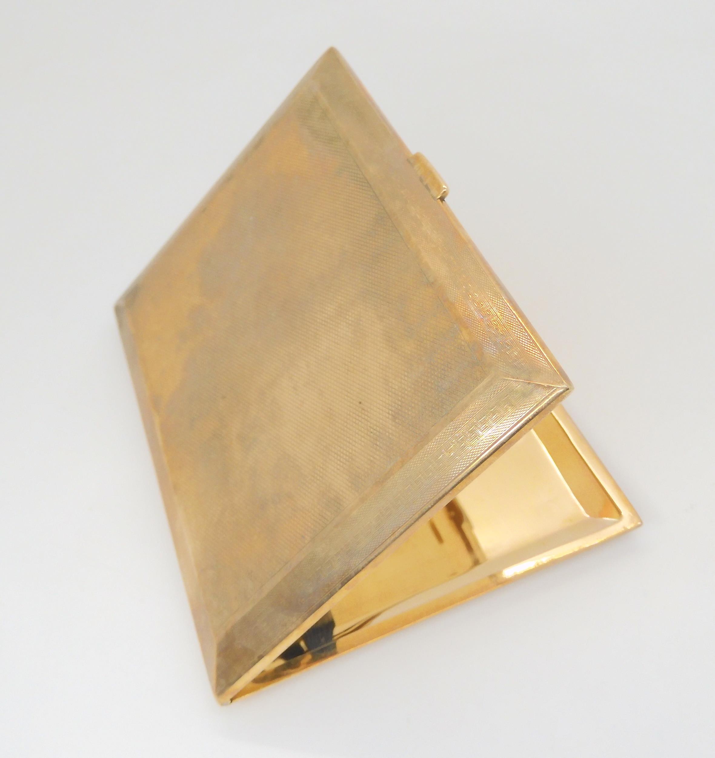 A 9ct gold cigarette case, hallmarked Birmingham 1927, made by William Neale & Son, 10.5cm x 8.