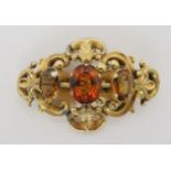 A Victorian citrine brooch, dimensions 5.8cm x 4cm, weight 18.1gms Condition Report:Available upon