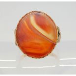 An 18ct gold carnelian signet ring, size L1/2, weight 5.1gms Condition Report:Think this has been