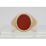 A heavy 9ct gold carnelian signet ring, size W1/2, weight 10.5gms Condition Report:Available upon