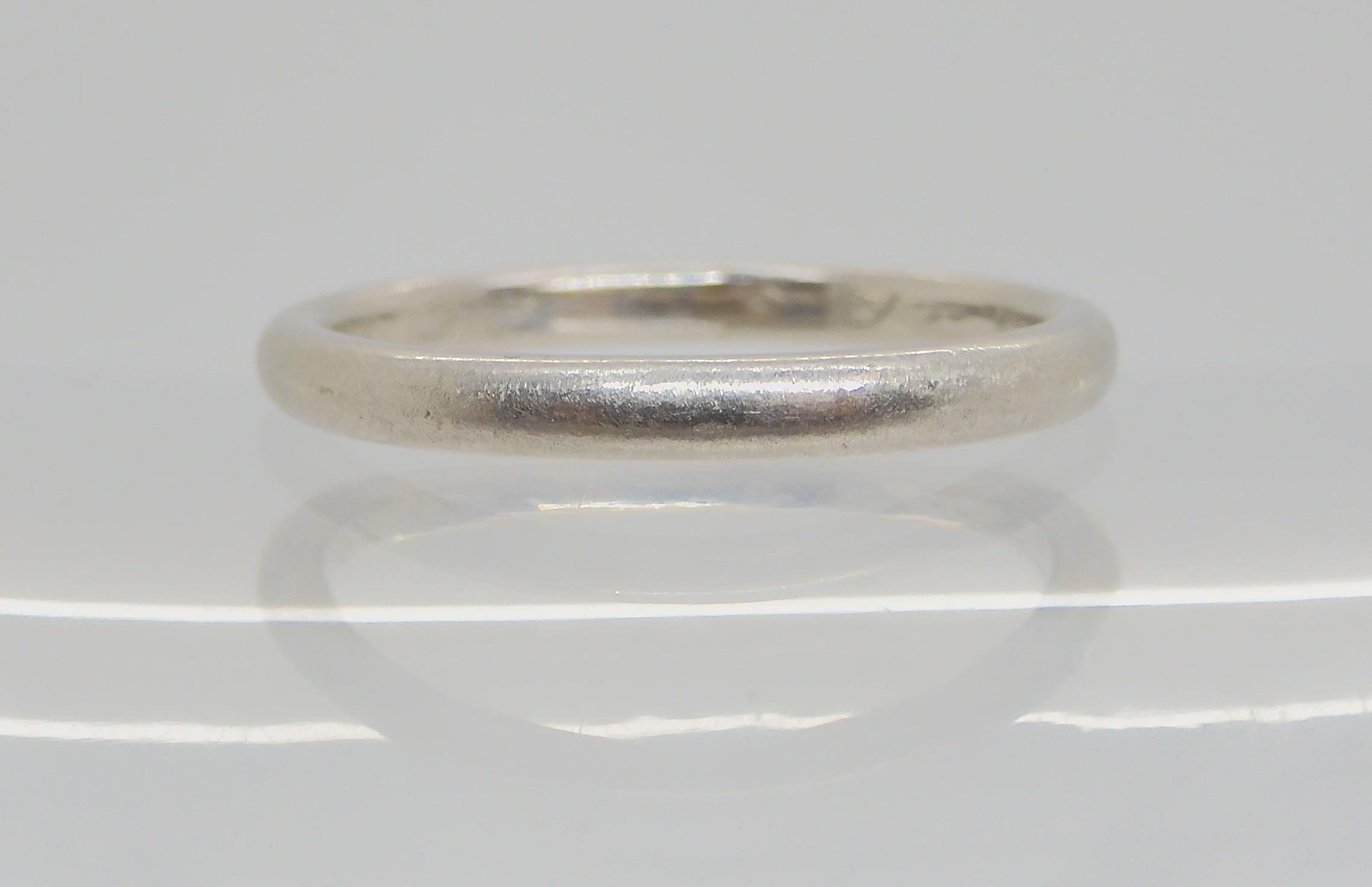 *WITHDRAWN* A platinum wedding band, size Q, weight 4.4gms Condition Report:Available upon request