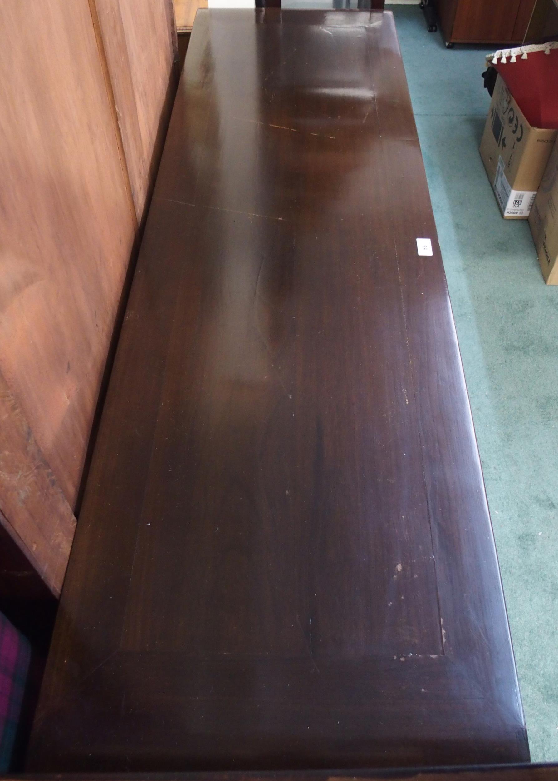 A 20th century Oriental hardwood sideboard with scroll end top over three drawers over pair of - Image 5 of 6