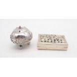 A Chinese silver snuff box, the lid with pierced floral openwork, the base embossed with vine