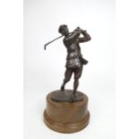 A bronze figure depicting a golfer in full swing on Plinth, height 30cm Condition Report:Available