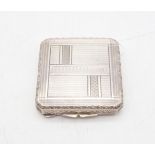 A French silver Art Deco compact, the body with engine turned decoration, marked 'COTY' to the