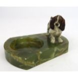 An Art Deco Austrian cold painted bronze Springer Spaniel mounted on green onyx pin tray base,