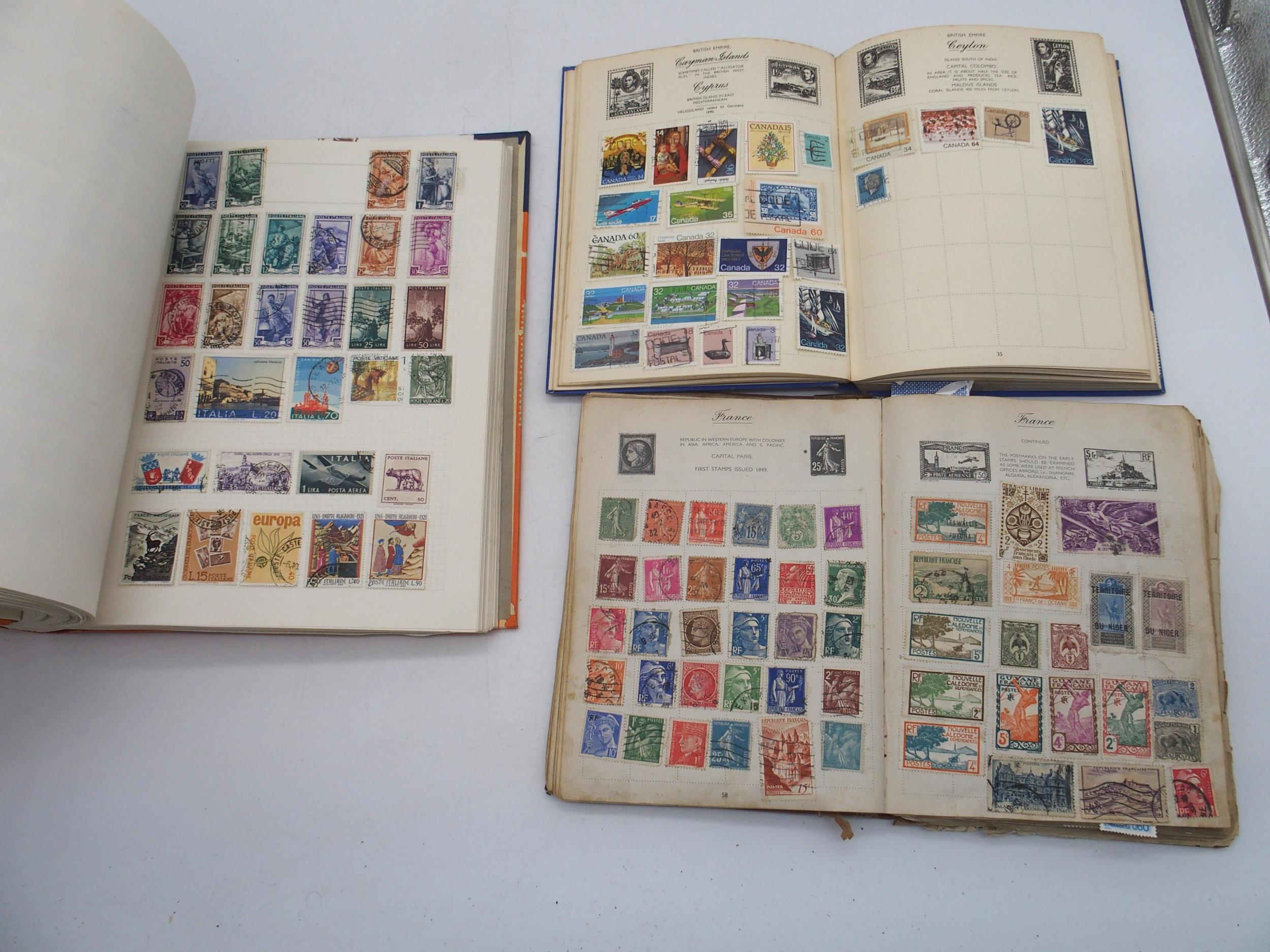 A box containing various stamps albums, including an International Unique Stamp Album, partially - Image 5 of 6