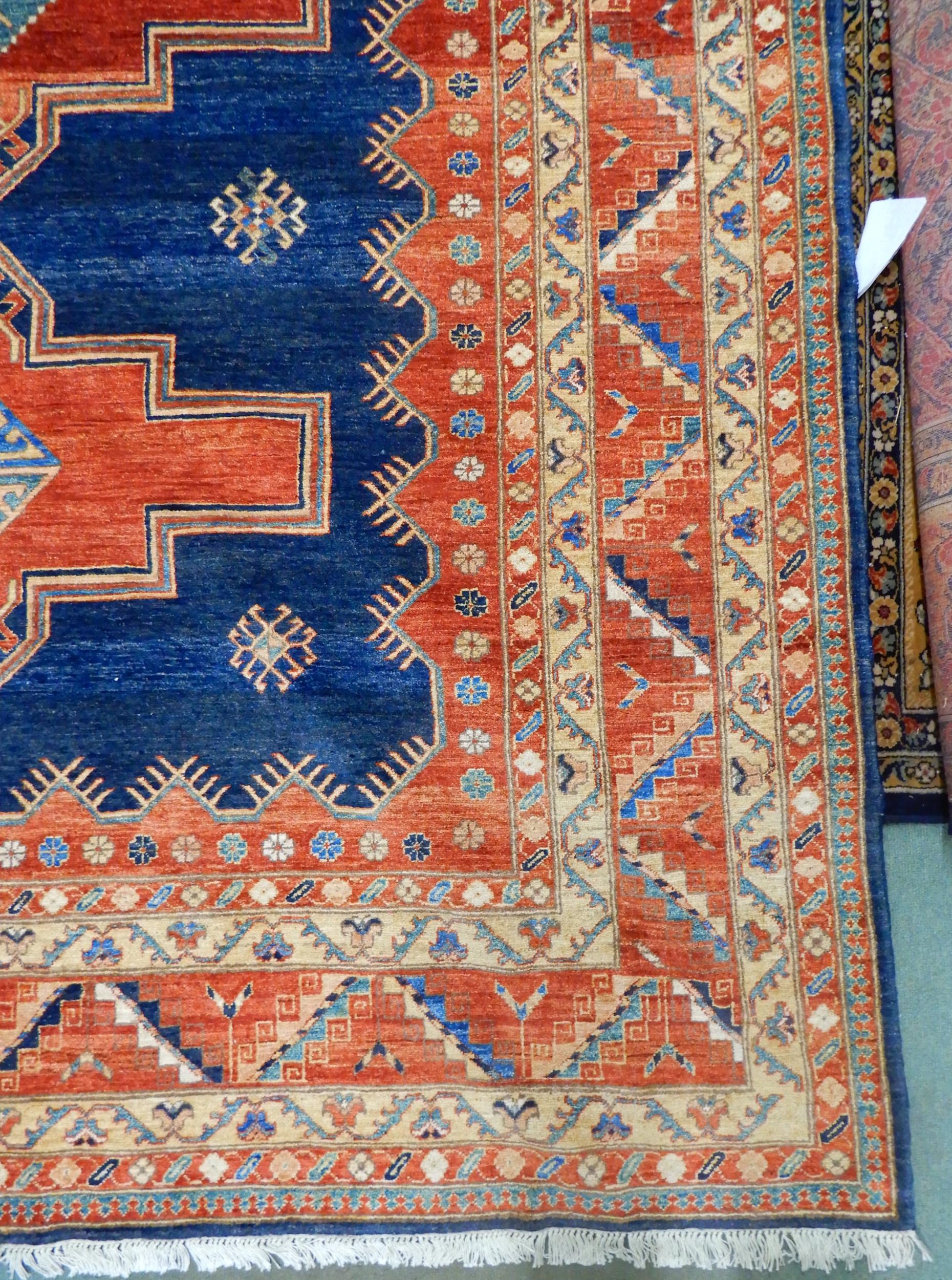 A dark blue ground Pakistani super Garous rug with three geometric medallions and multicoloured - Image 2 of 5