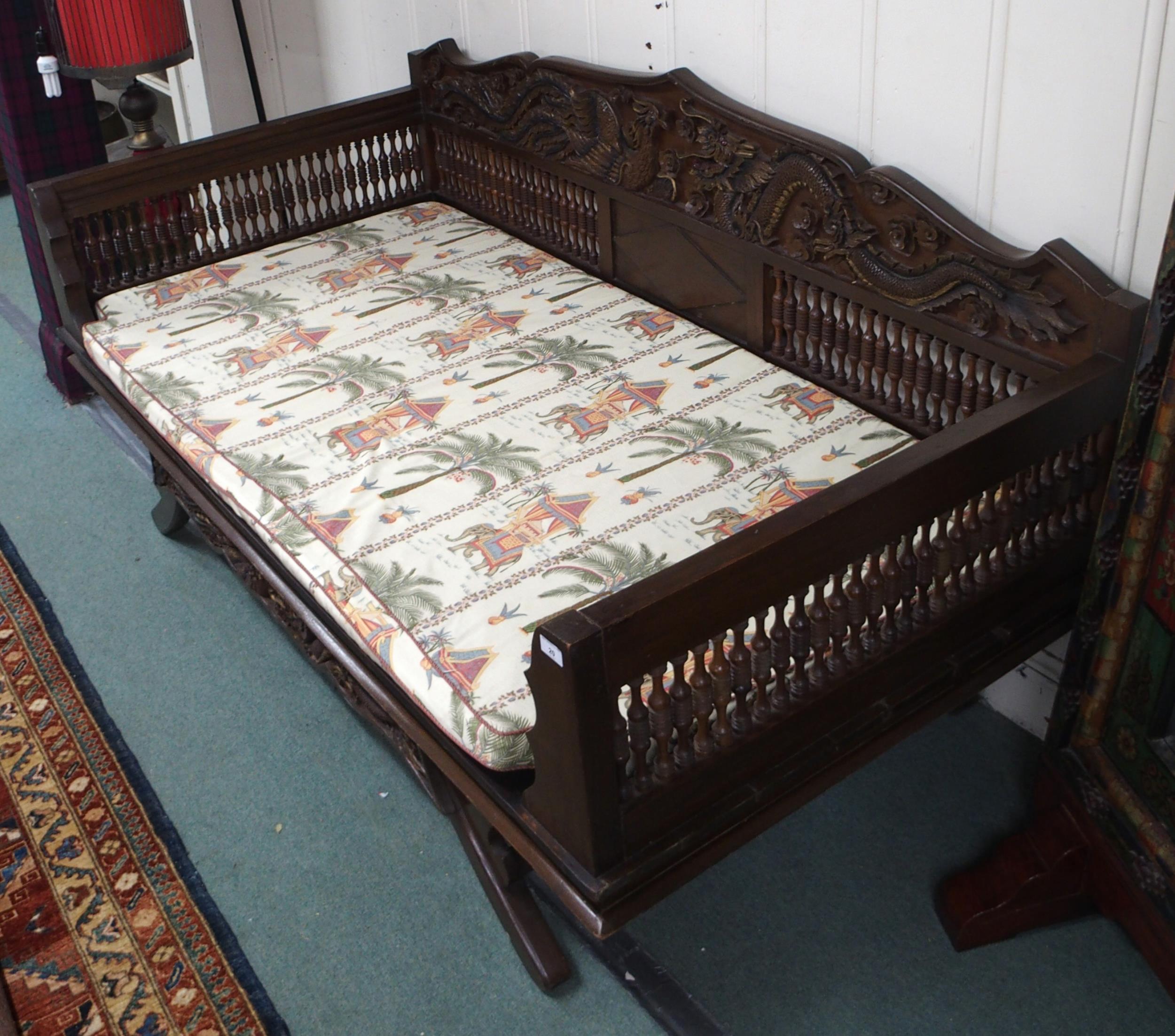 A contemporary Oriental hardwood day bed with carved back depicting phoenix and dragon over - Image 5 of 7