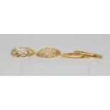 An 18ct gold wedding ring, size N, weight 2.4gms, and three 9ct gold rings, wedding ring size O1/