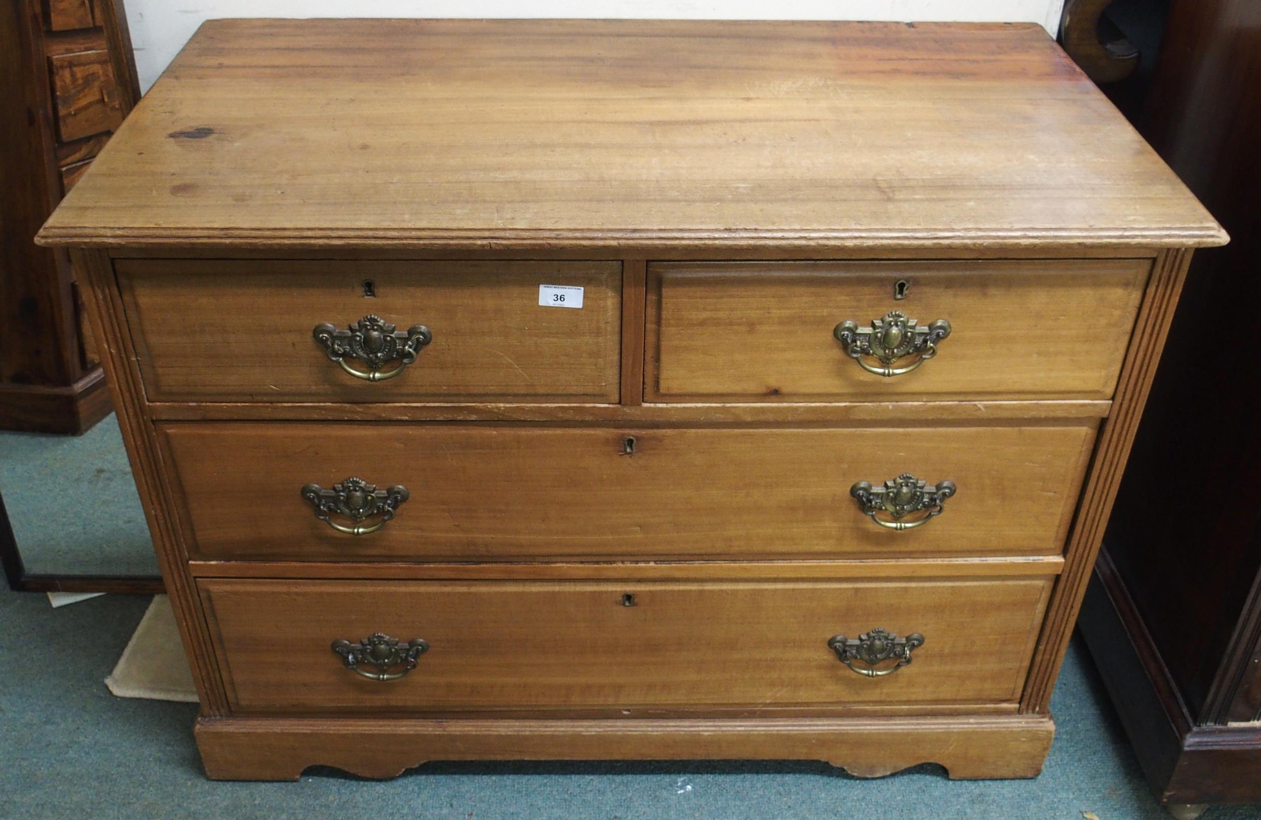 An early 20th century pine two over two chest of drawers, 76cm high x 102cm wide x 53cm deep and two