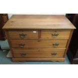 An early 20th century pine two over two chest of drawers, 76cm high x 102cm wide x 53cm deep and two