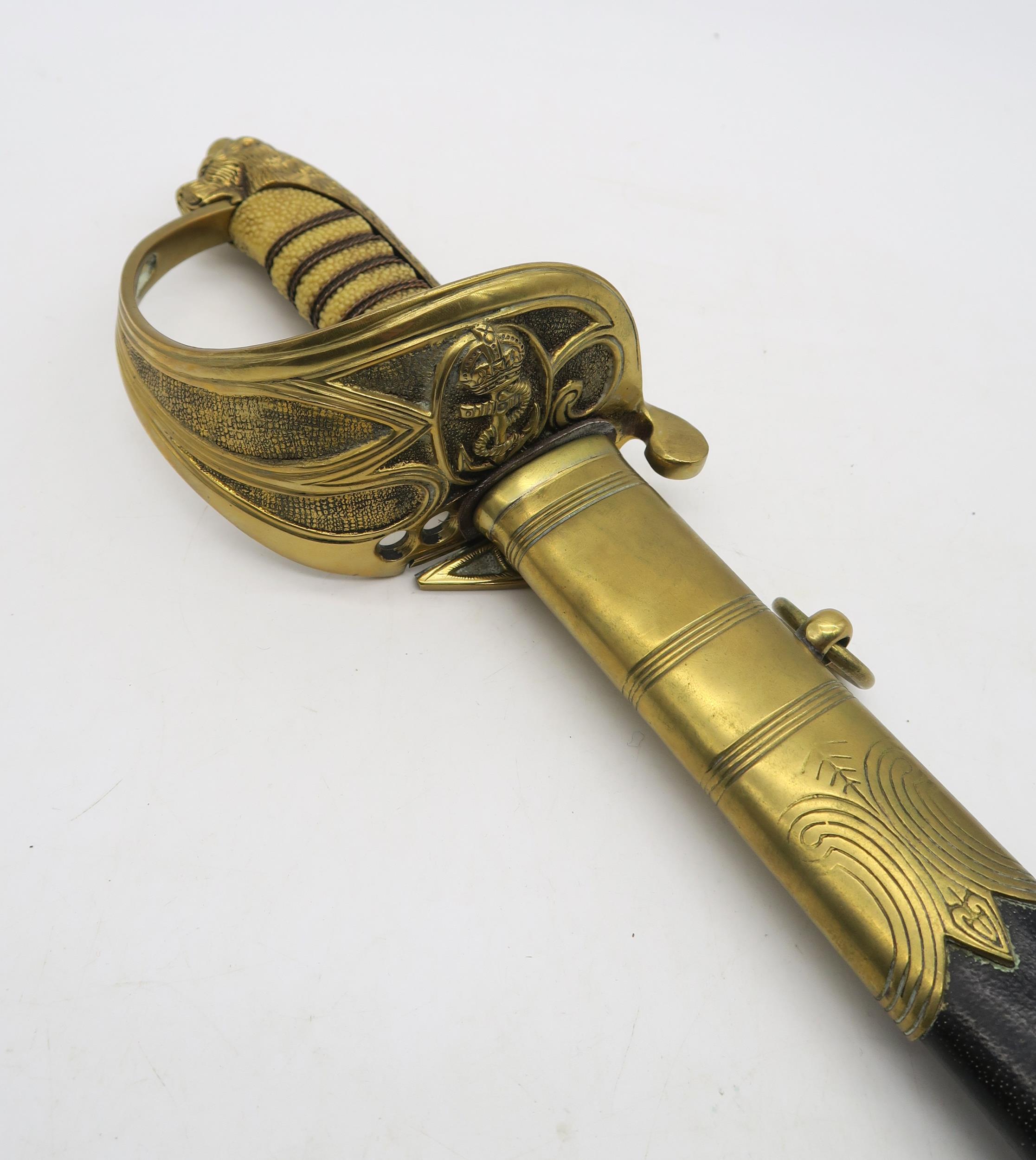 A reproduction Royal Navy officer's 1827 pattern dress sword, the blade measuring approx. 79.5cm