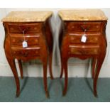 A pair of 20th century French marble topped bombe bedside tables with shaped marble tops over