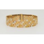 A 9ct three colour gold bracelet, length 18cm, weight 29.1gms Condition Report:Available upon