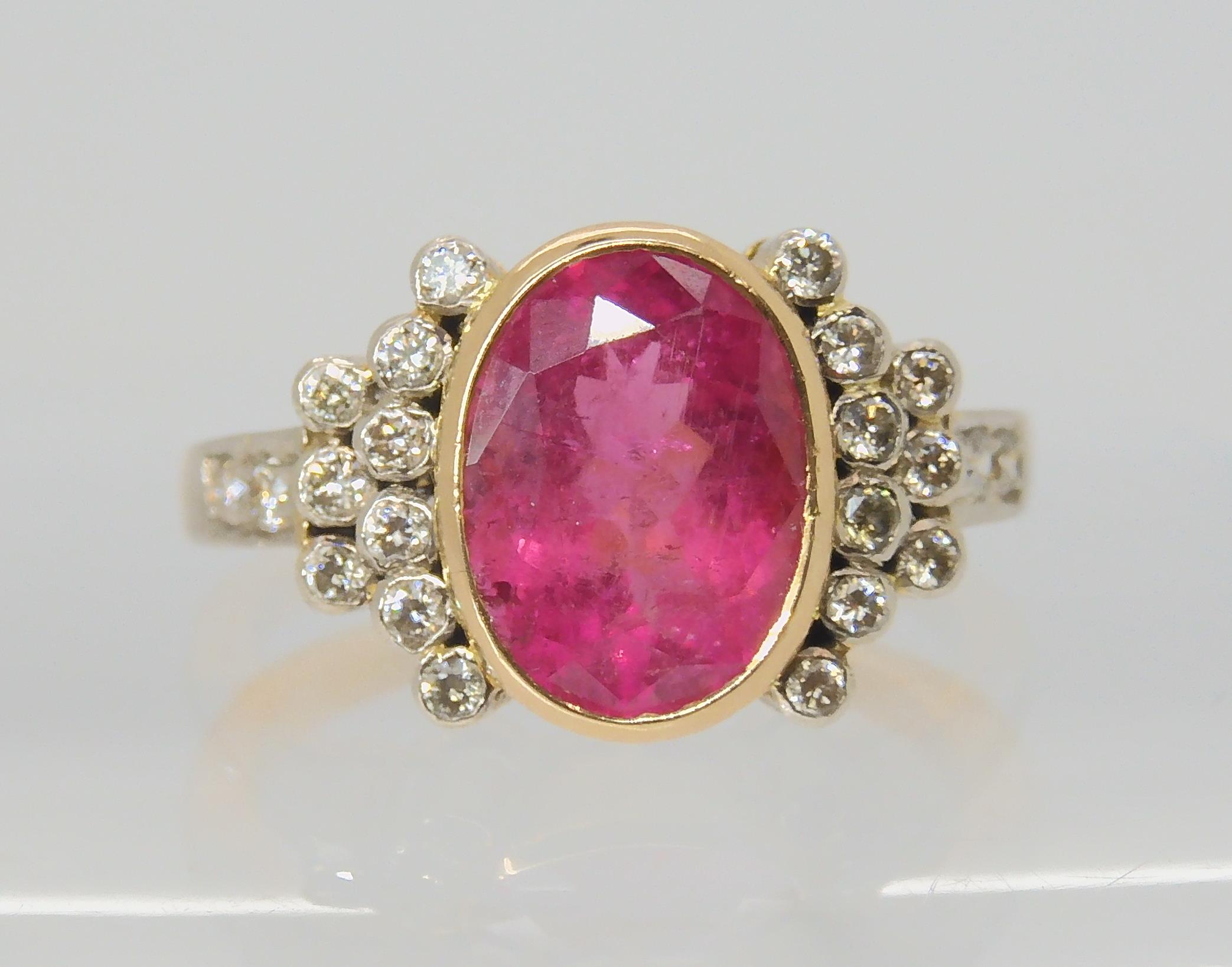 A PINK TOURMALINE AND DIAMOND RING the mount is stamped 750 for 18ct, and set with a 10.8mm x 8. - Image 2 of 10