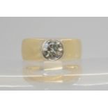 A DIAMOND SOLITAIRE RING set with an estimated approx 0.60cts brilliant cut diamond in a bezel